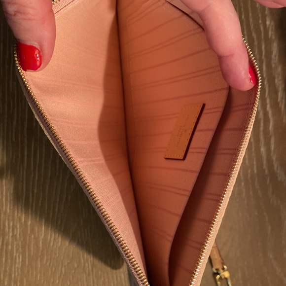 Brand new. Received a replacement neverfull and already have this wristlet. - Picture 3 of 3